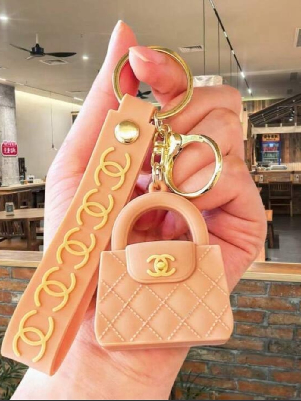 CHANEL Peach Quilted Mini Bag Keychain with Gold Hardware